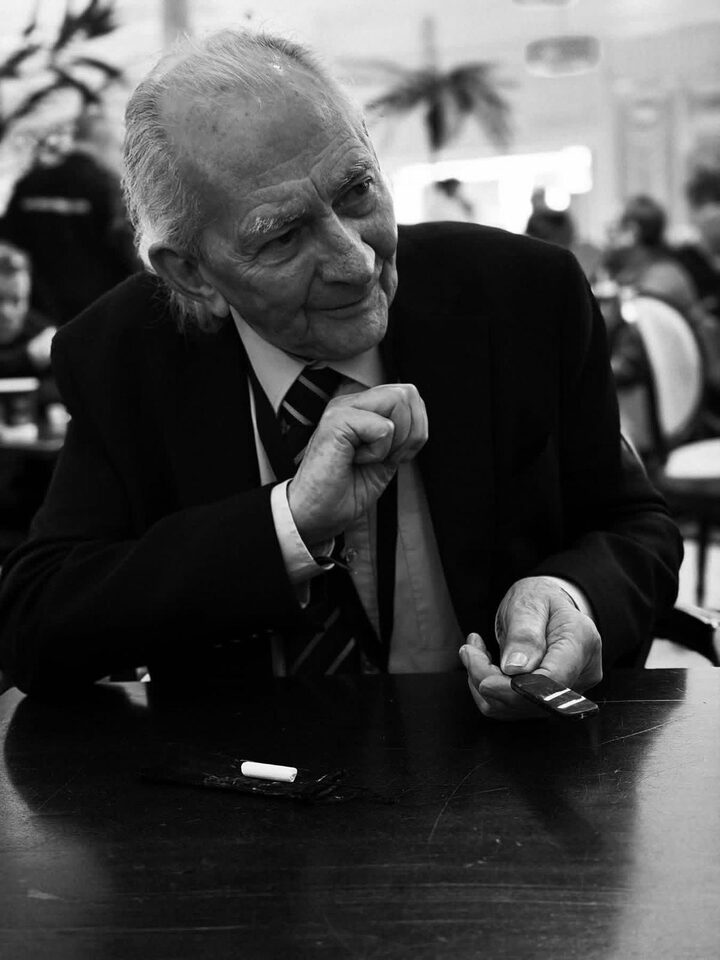 Close-up card magic portrait during table service